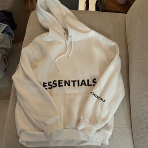 Essentials Off-White Hoodie with Black Print